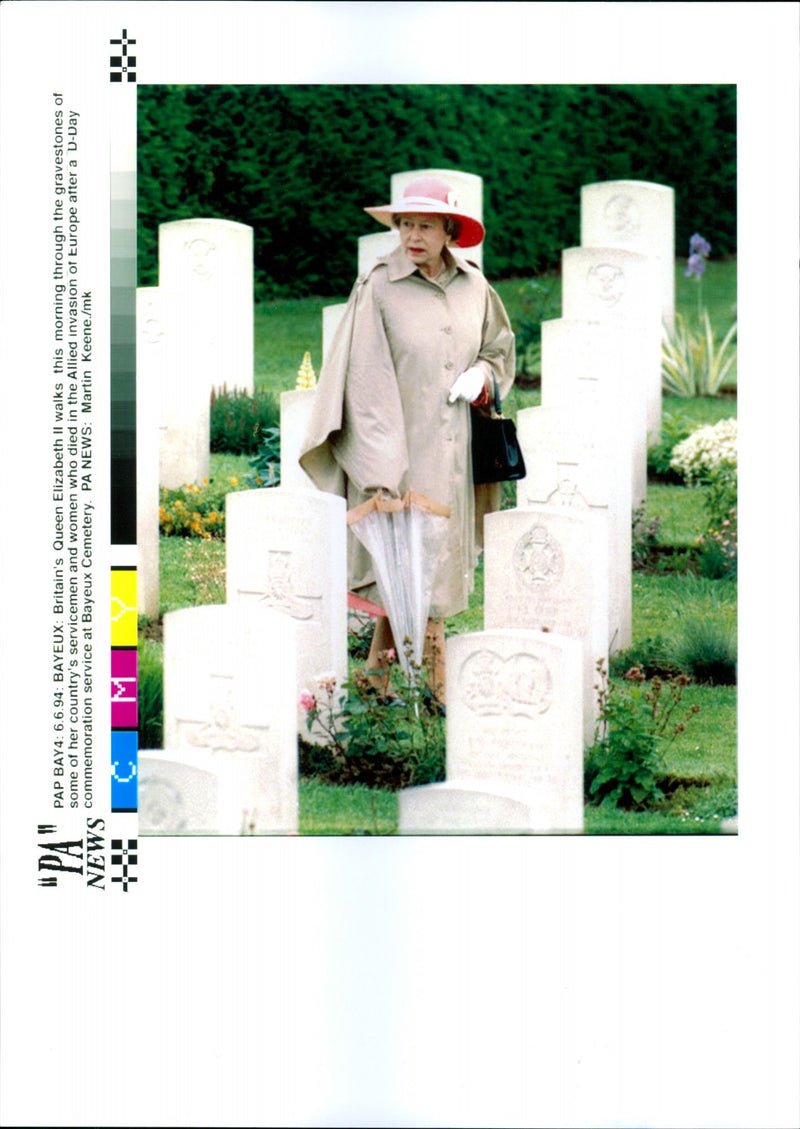 Queen Elizabeth II walks through the gravestones at Bayeux Cemetery - Vintage Photograph