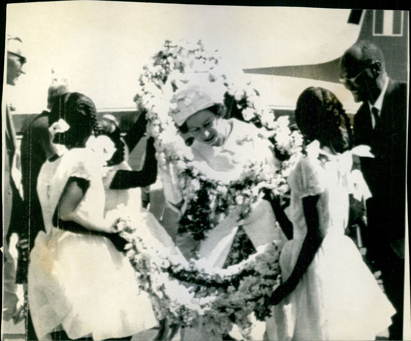 Queen Elizabeth II presented with flowers on her arrival in Khartoum - Vintage Photograph
