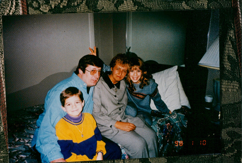 American Tara Lipinski won the Olympic figure skating medal in the 18th Olympic Winter Games which took place in Nagano, Japan. Picture shows Chris Clinton, Uncle Phil, Aunt Edith and Tara Lipinski. - Vintage Photograph