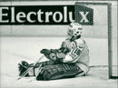 Farjestad's goaltender Peter Lindmark relaxes after defend a shot - Vintage Photograph