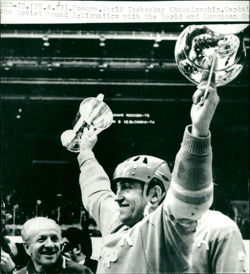 Soviet ice hockey player Boris Mikhailov with World and European Cup. - Vintage Photograph