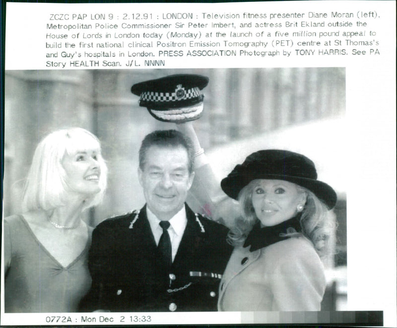 Fitness presenter Diane Moran, Met Police Commissioner Sir Peter Imbert and actress Britt Ekland outside the House of Lords in London - Vintage Photograph