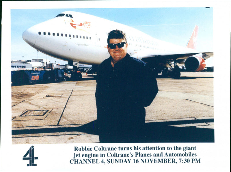 Robbie Coltrane turns his attention to the giant jet engine in Coltrane's Planes and Automobiles - Vintage Photograph