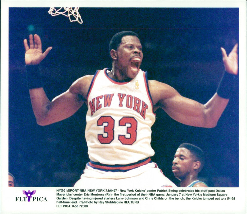 Patrick Ewing celebrated his stuff past Dallas Mavericks' center Eric Montross (R) in the first period of the game. - Vintage Photograph