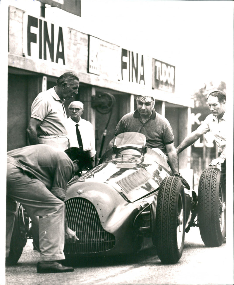 Manuel Juan Fangio in his Alfa Romeo when filming his life at the Monsa racing track - Vintage Photograph