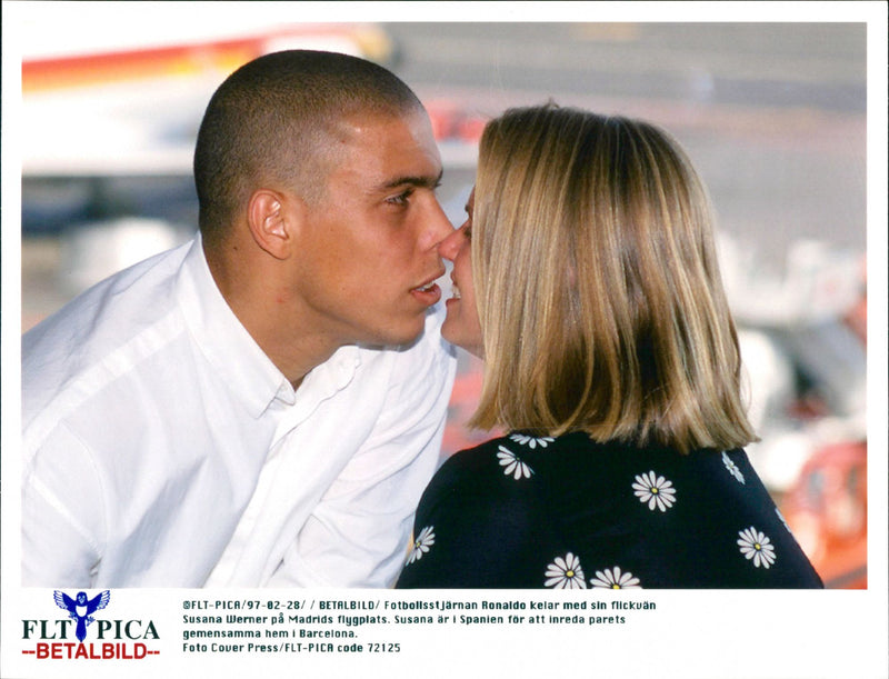 Ronaldo with his girlfriend Suzana Werner at Madrid's airport. - Vintage Photograph