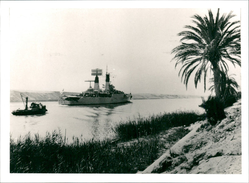 The 2,100-ten Sallsbury-class frigate, HMS LLANDAFF, seen passing through the Suez Canal. - Vintage Photograph