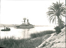 The 2,100-ton Sallsbury-class frigeta, HMS LLANDAFF, seen passing through the Suez Canal. - Vintage Photograph