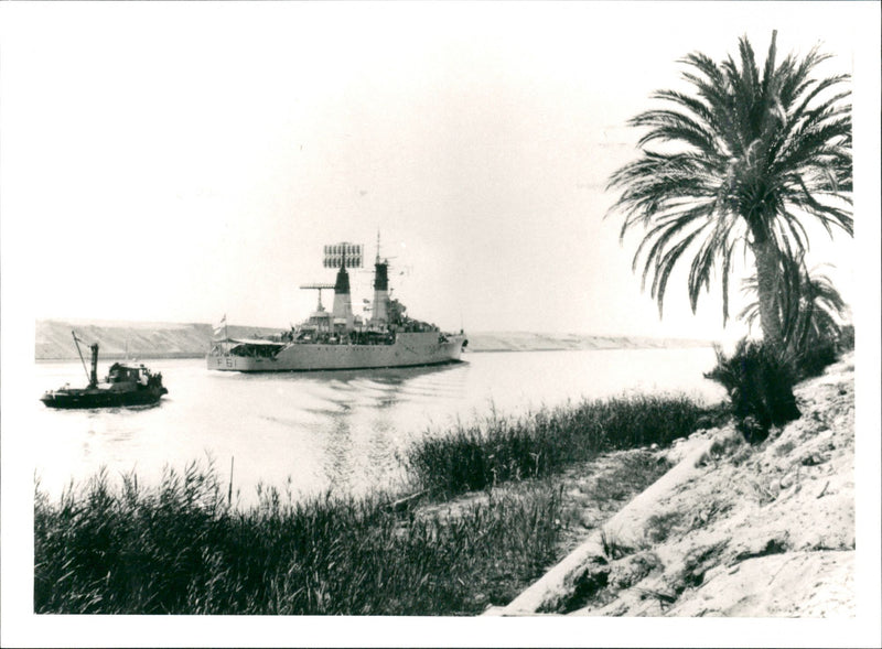 The 2,100-ton Sallsbury-class frigeta, HMS LLANDAFF, seen passing through the Suez Canal. - Vintage Photograph