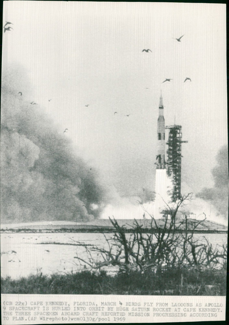 Apollo 9 spacecraft is hurled into orbit by huge Saturn 5 rocket - Vintage Photograph