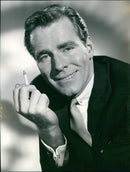 Philip Carey smoking a cigar as Tim O'Bannion in Wicked As They Come - Vintage Photograph