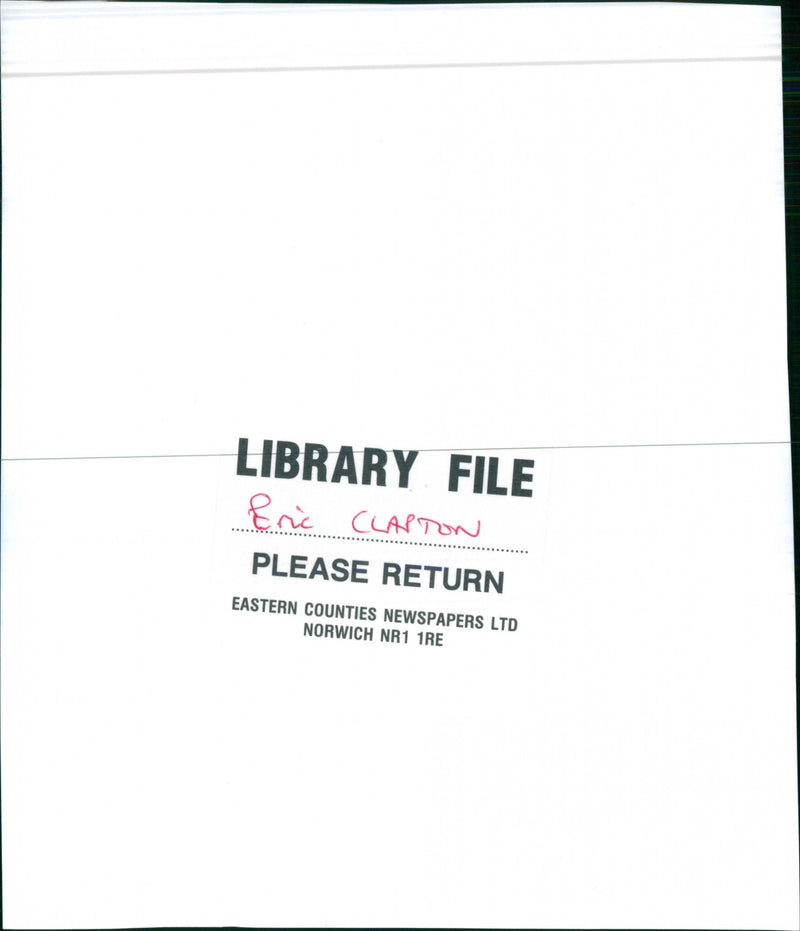 Eric Clapton is loaded with the six Grammys he was awarded at annual Grammy Awards in Los Angeles. - Vintage Photograph
