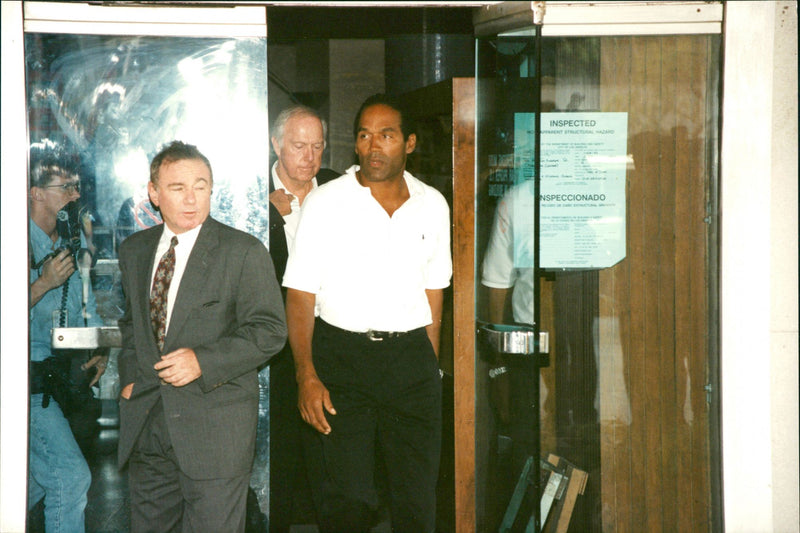 OJ Simpson with his lawyer Howard Weitzman after questioning - Vintage Photograph