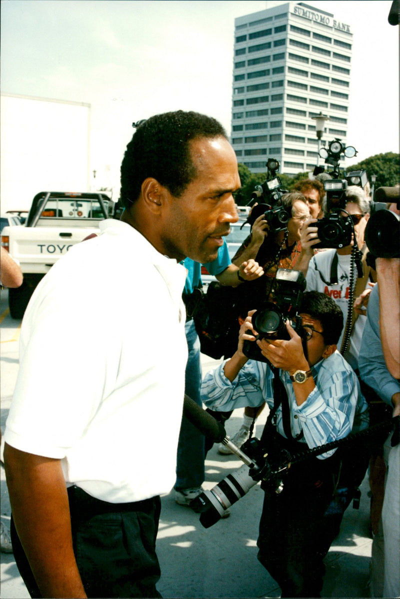 OJ Simpson leaves the police house after a murder trial - Vintage Photograph