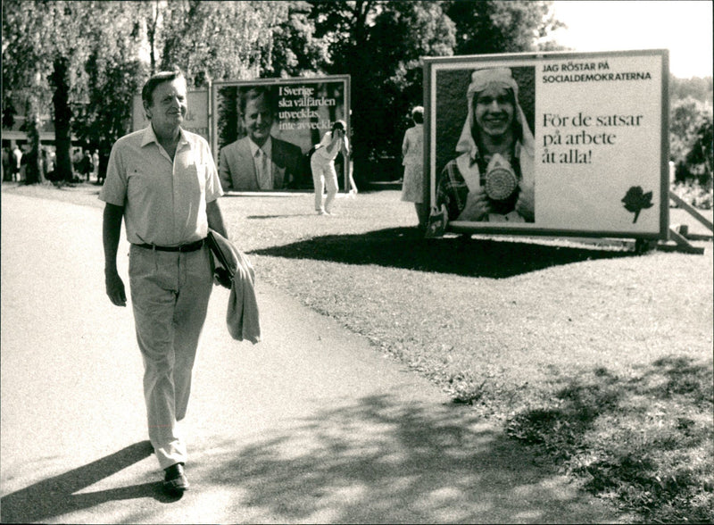 Olof Palme walks in front of Social Democratic election posters - Vintage Photograph