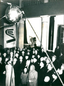 Muscovites with a Model of Satellite Sputnik 1, 1957 - Vintage Photograph