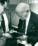 Nobel Prize Winner In Literature 1978 Isaac Bashevis Singer Signing an Autograph In His Books - Vintage Photograph