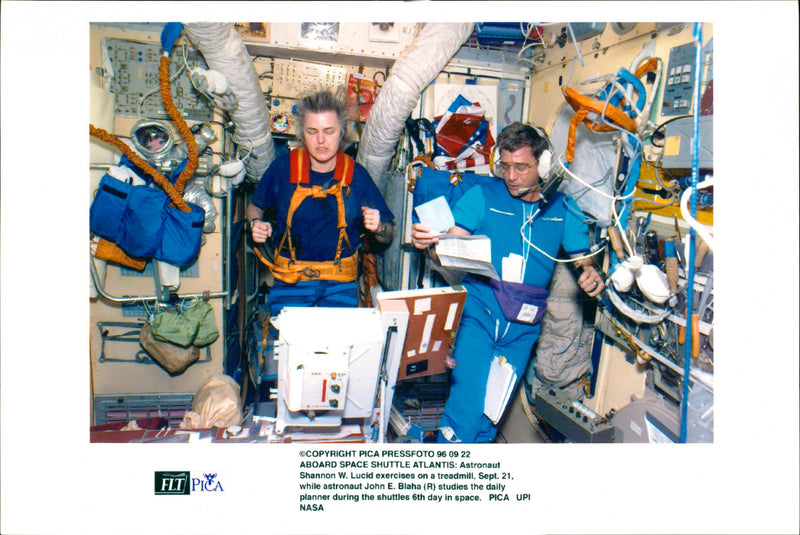 US astronauts Shannon Lucid and John E. Blaha in the Space Shuttle Atlantis - Vintage Photograph