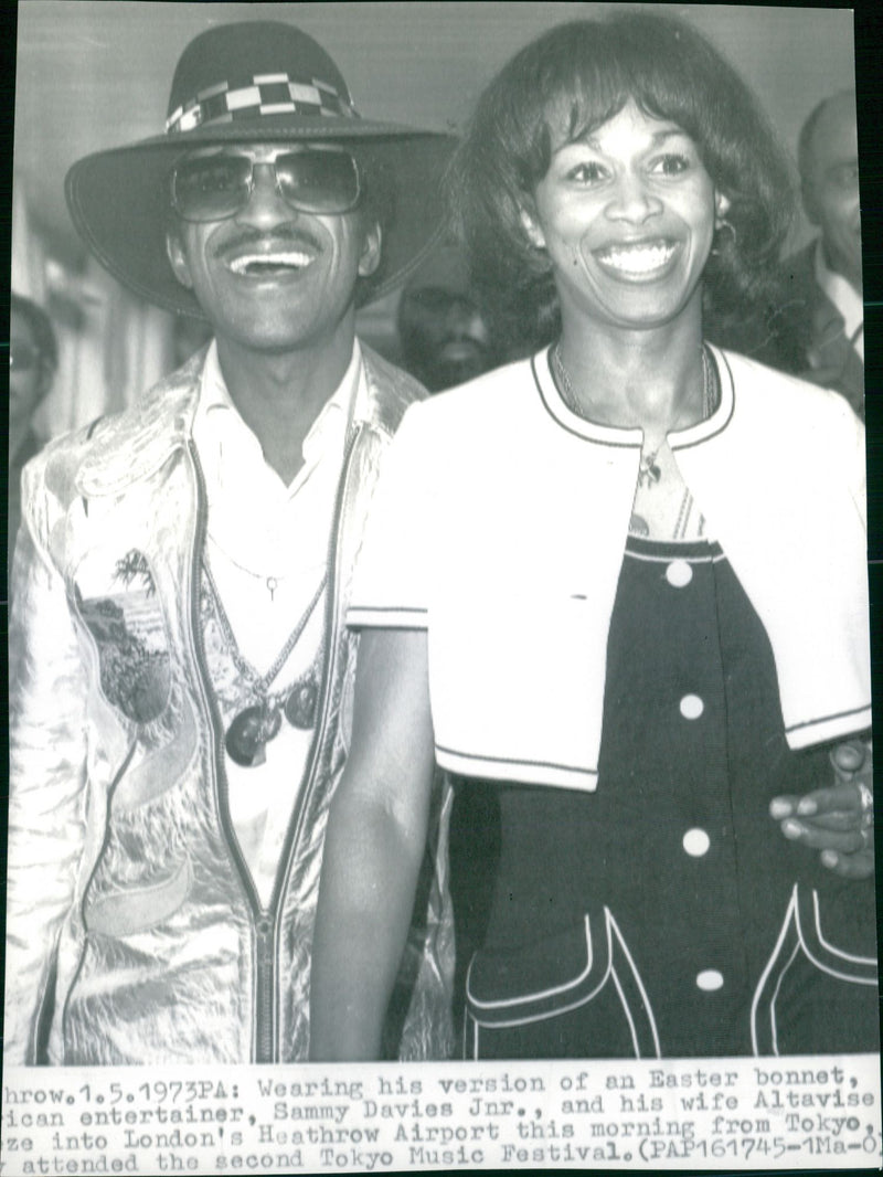 Sammy Davis Jr. and his wife Altovise at Heathrow Airport - Vintage Photograph