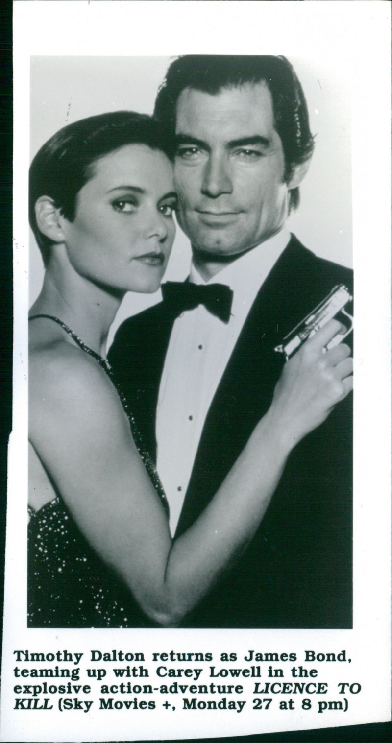 Timothy Dalton and Carey Lowell - Vintage Photograph