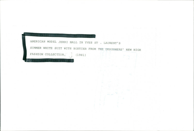 Women's fashion American model Jerri Hall in Yves Saint Laurent summer white suit 1981 - Vintage Photograph