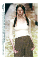 A model displays an outfit by Israeli designer Ronit Zilkha during her show on the first day of London Fashion Week. - Vintage Photograph