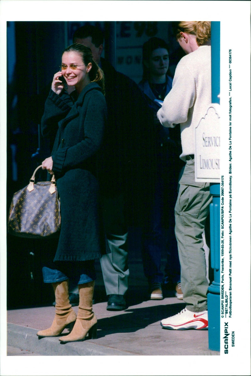 Soccer player Emmanuel Petit with girlfriend Agathe De La Fontaine at Eurodisney - Vintage Photograph