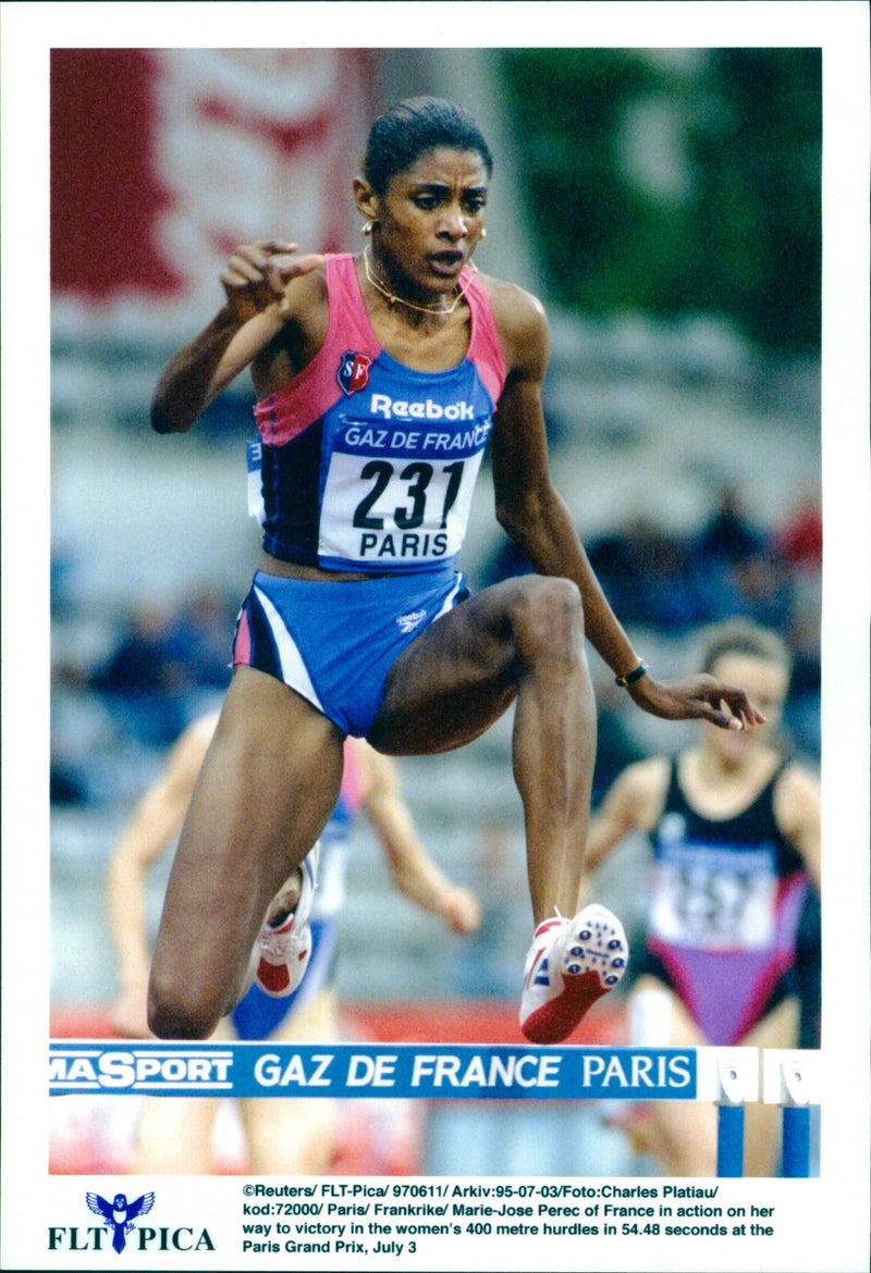 French sprinter Marie-Jose Perec in action during 400 metre hurdles - Vintage Photograph