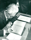 Yasunari Kawabata writes in the Nobel Foundation's guestbook - Vintage Photograph