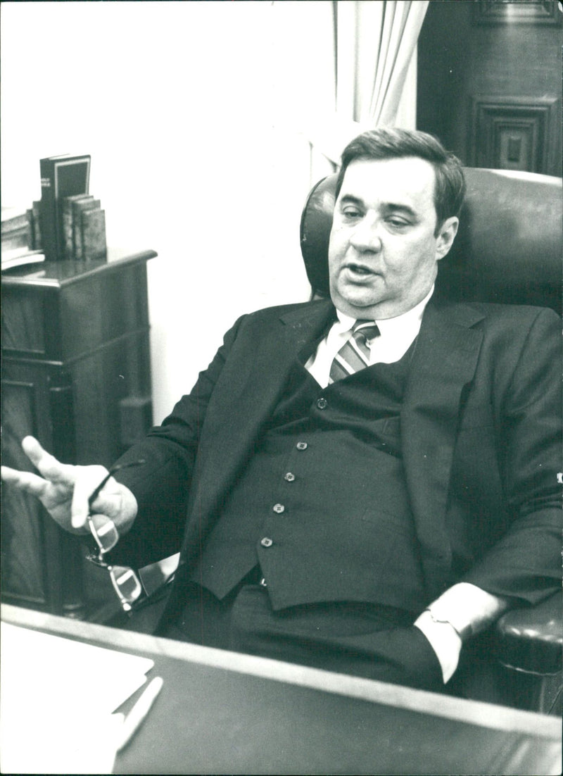 Thomas Bertram Lance, Director of the Office of Management and Budget, and one of President Jimmy Carter's top aides, in his Washington office. - Vintage Photograph