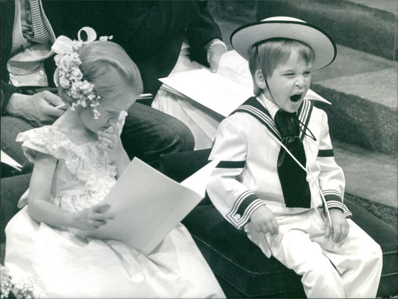 An unstifled yawn from Prince William during wedding ceremony of Prince Andrew at Westminster Abbey - Vintage Photograph