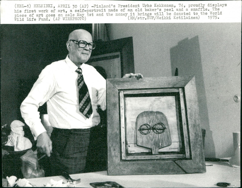 President Urho Kekkonen displays his first work of art - Vintage Photograph