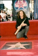 American Musician and Saxophonist Kenny G's Star on Hollywood Walk of Fame - Vintage Photograph