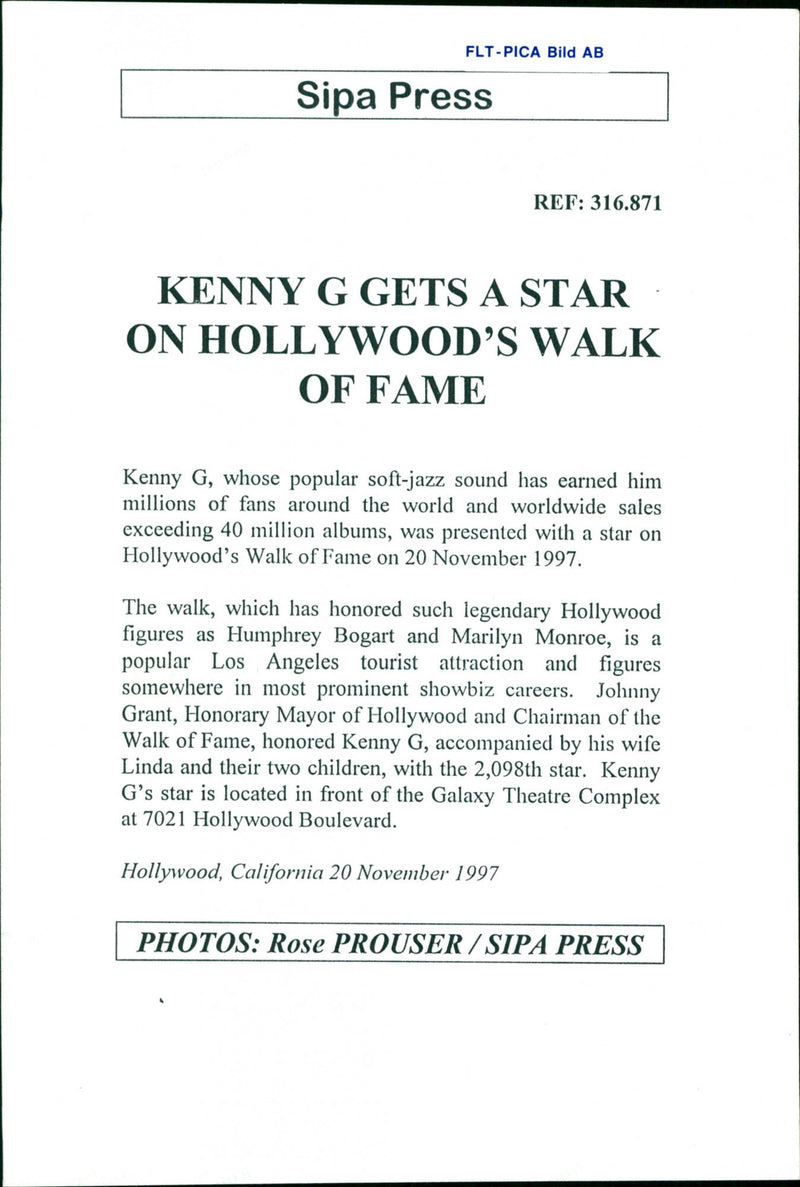 American Musician and Saxophonist Kenny G Gets A Star of Hollywood's Walk of Fame - Vintage Photograph