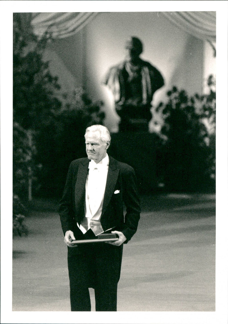 Nobel Prize ceremony in the concert hall 1990. Henry W Kendall receives the Nobel Prize in Physics from the King's hand. - Vintage Photograph