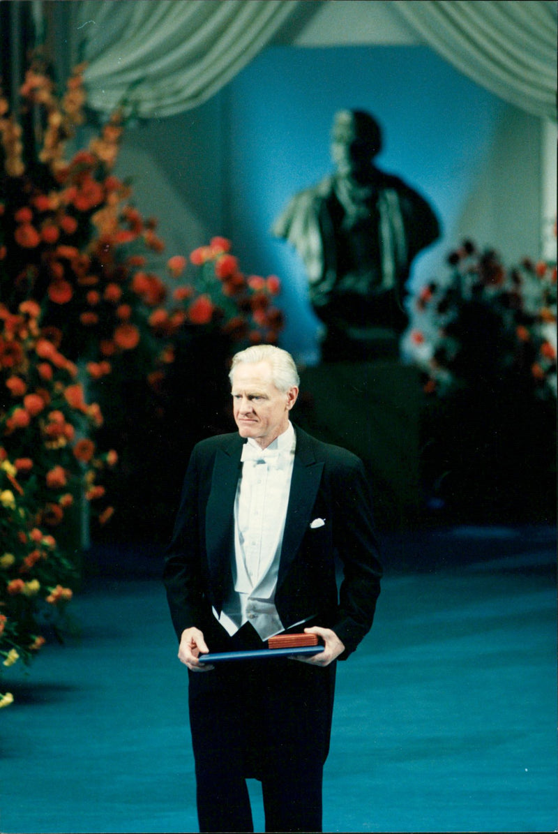 Nobel Prize ceremony in the concert hall 1990. Henry W Kendall receives the Nobel Prize in Physics from the King's hand. - Vintage Photograph