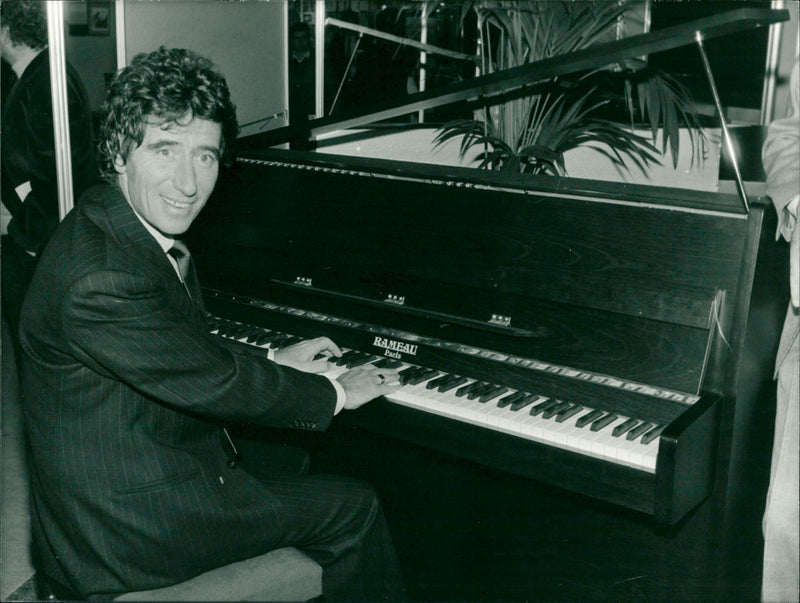 France's Minister of Culture Jack Lang plays the piano
at the International Music Fair - Vintage Photograph