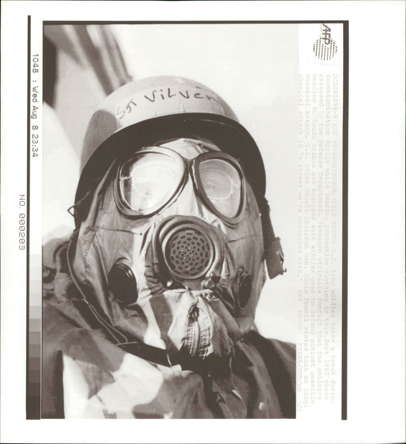 US Army soldier wearing protective clothing - Vintage Photograph