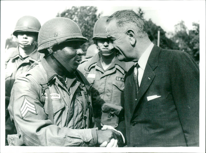 Vice President Lyndon B. Johnson shakes hands with an American soldier in Berlin - Vintage Photograph