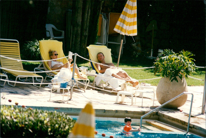 Sting and Trudie Styler at the hotel pool in Jerusalem - Vintage Photograph