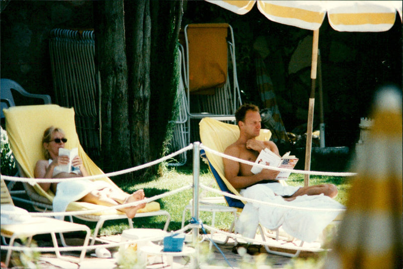 Sting and Trudie Styler at the hotel pool in Jerusalem - Vintage Photograph