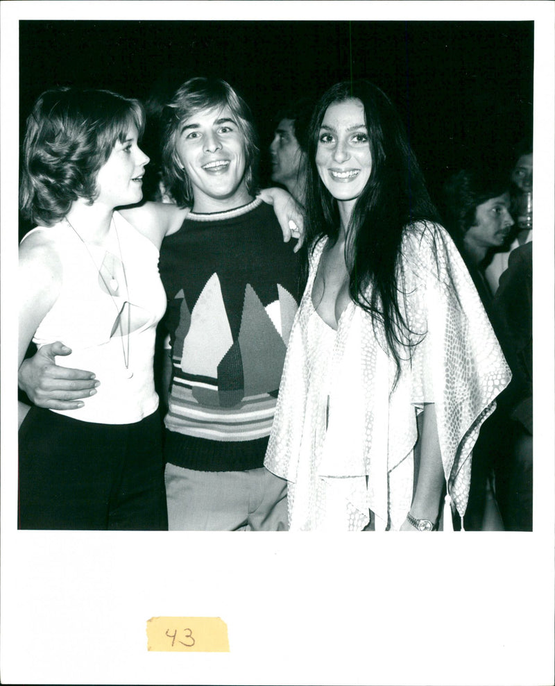 Newlyweds Melanie Griffith and Don Johnson at their wedding reception together Cher - Vintage Photograph