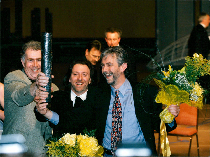 Paul Harrington and Charlie McGettigan sang the winning song Rock'n'-roll kids. Here together with the copywriter Brendan Graham - Vintage Photograph