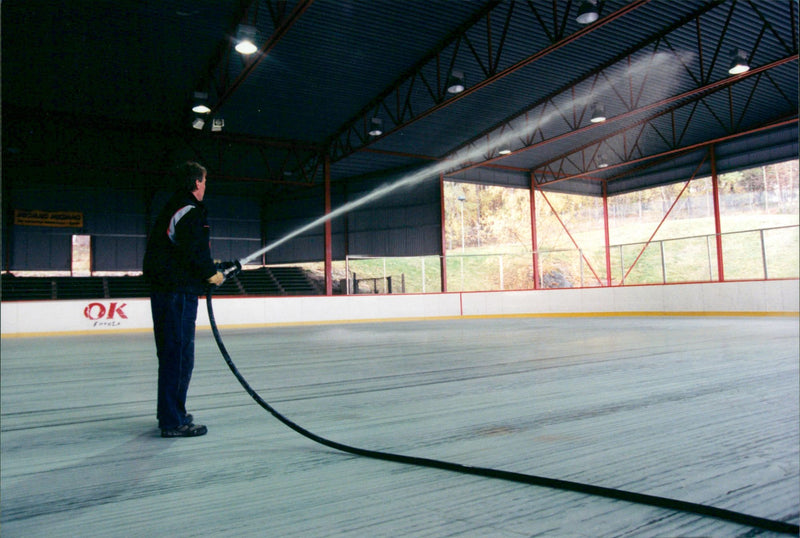 The ice is flushed in the Farsta ice rink - Vintage Photograph