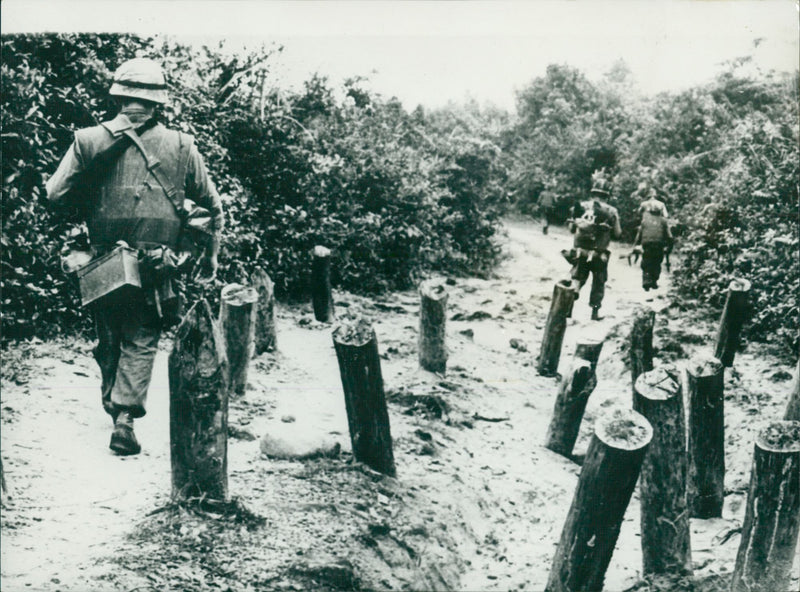 US soldiers march past primitive tanks - Vintage Photograph