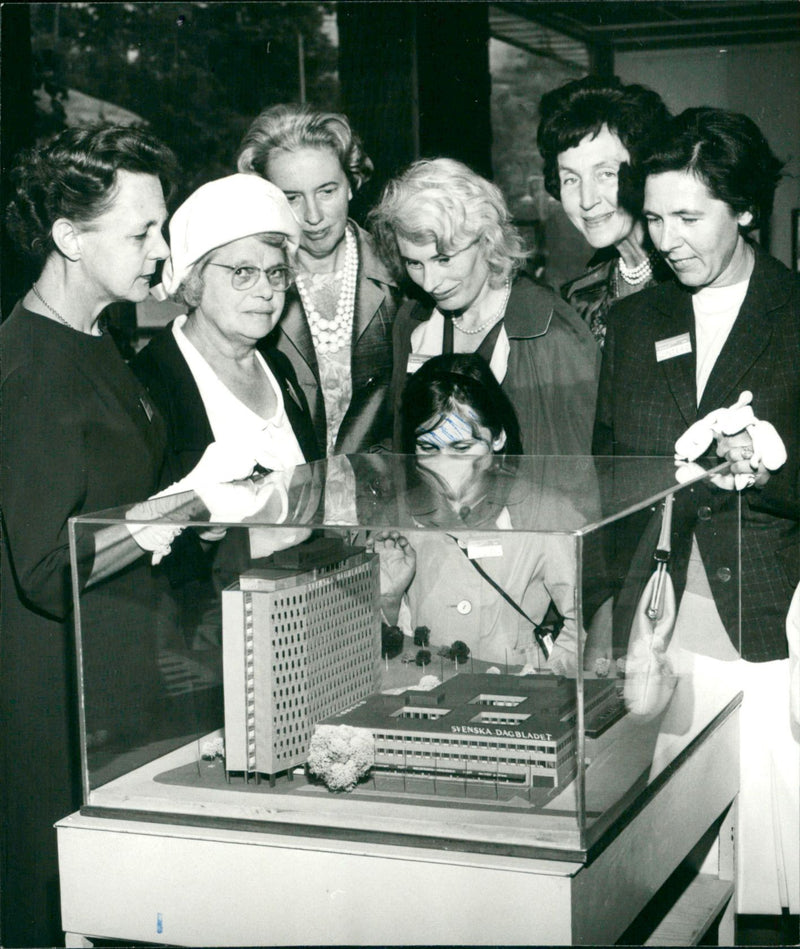 The model of the SvD house is studied by Mrs Speller, Mrs Wise, Mrs Kidd and the women Friberg and Winterö - Vintage Photograph