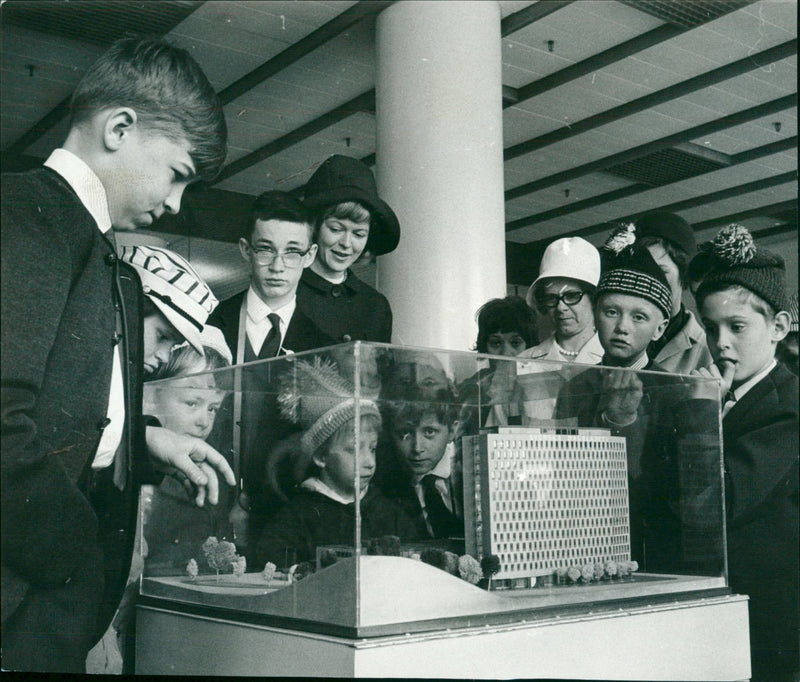 Young people look at the model of Svenska Dagbladet - Vintage Photograph