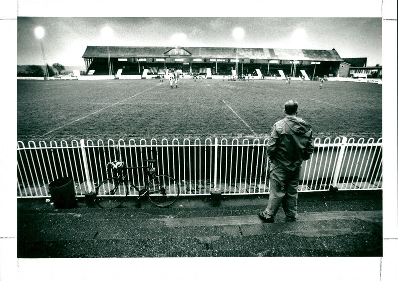 Man watching football game - Vintage Photograph