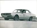 Datsun 240K GT (C110) - Vintage Photograph