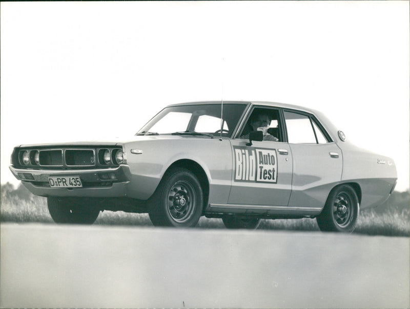 Datsun 240K GT (C110) - Vintage Photograph